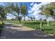Scenic golf course with manicured greens, clear blue skies, and mature trees at 520 S Greenfield Rd # 22, Mesa, AZ 85206