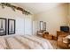 Bedroom boasts decor, a chest, comfortable seating, and a queen bed at 5812 S Staghorn Cholla Ct, Gold Canyon, AZ 85118