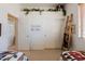 Bedroom featuring decorative plants and a wooden ladder with two twin beds partially shown at 5812 S Staghorn Cholla Ct, Gold Canyon, AZ 85118