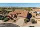 Charming single-story home with a tile roof, desert landscaping, and a two-car garage in a golf course community at 5812 S Staghorn Cholla Ct, Gold Canyon, AZ 85118