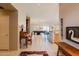 Welcoming entry featuring a desk and providing a view to the open floor plan beyond at 5812 S Staghorn Cholla Ct, Gold Canyon, AZ 85118