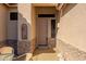 Inviting front entrance with stone accents and a charming decor at 5812 S Staghorn Cholla Ct, Gold Canyon, AZ 85118