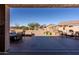 Inviting outdoor patio features a fireplace and comfortable seating, perfect for relaxing and entertaining in the desert landscape at 5812 S Staghorn Cholla Ct, Gold Canyon, AZ 85118