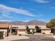 Neighborhood street view of desert homes with mountain views in the distance under blue sky at 5812 S Staghorn Cholla Ct, Gold Canyon, AZ 85118