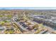 Aerial view of the property highlighting easy access to a road, surrounding community, and ample parking at 604 E Weber Dr # 12, Tempe, AZ 85288