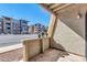 Balcony view of condo complex with outdoor area, railing and a small decorative garden at 604 E Weber Dr # 12, Tempe, AZ 85288