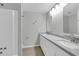Bright bathroom featuring double vanity, granite countertops, and tub-shower combo at 604 E Weber Dr # 12, Tempe, AZ 85288