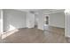 Bright bedroom with wood floors, a large closet with mirrored doors and a neutral color scheme at 604 E Weber Dr # 12, Tempe, AZ 85288