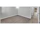 Bedroom featuring new paint, durable floors, and updated lighting fixture at 604 E Weber Dr # 12, Tempe, AZ 85288