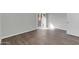 Bright bedroom with new flooring and a sliding glass door to a balcony at 604 E Weber Dr # 12, Tempe, AZ 85288
