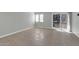 Bright, airy room with tile flooring and sliding glass doors that provide access to a balcony at 604 E Weber Dr # 12, Tempe, AZ 85288