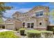 Inviting two-story home featuring a neutral color palette, well-maintained landscaping, and an attached two-car garage at 6204 S Banning St, Gilbert, AZ 85298