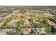 Wide aerial shot showing residential neighborhood with a mix of homes, landscaping, and streets at 8336 S Homestead Ln, Tempe, AZ 85284