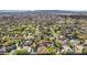 Expansive aerial view of a residential neighborhood with lush trees and well-maintained homes at 8336 S Homestead Ln, Tempe, AZ 85284