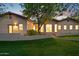 Lovely home featuring manicured lawn and desert landscaping at 8336 S Homestead Ln, Tempe, AZ 85284