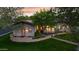 Charming home with a well-manicured front yard, mature trees, and inviting walkway enhances curb appeal and neighborhood charm at 8336 S Homestead Ln, Tempe, AZ 85284