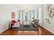 Bright living room with hardwood floors, neutral decor, and large windows for natural light at 8336 S Homestead Ln, Tempe, AZ 85284