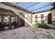 Spacious patio with a partial roof offers indoor-outdoor living space at 8336 S Homestead Ln, Tempe, AZ 85284