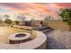 An inviting outdoor living space with fire pit and patio at 8542 E Indigo St, Mesa, AZ 85207