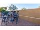 Outdoor seating area featuring patio table with barstools on paver patio at 8542 E Indigo St, Mesa, AZ 85207