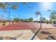 Community outdoor basketball court with lighting, providing recreational opportunities for residents at 8542 E Indigo St, Mesa, AZ 85207