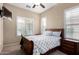 Comfortable bedroom with neutral tones and a well lit interior with lots of natural light at 8542 E Indigo St, Mesa, AZ 85207