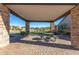 Community pavilion with multiple picnic tables providing a shaded seating area for gatherings at 8542 E Indigo St, Mesa, AZ 85207