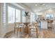Open dining area with wood flooring and lots of natural light at 8877 E Riviera Dr, Scottsdale, AZ 85260