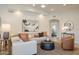 Cozy living room with modern furniture and bright neutral walls at 8877 E Riviera Dr, Scottsdale, AZ 85260