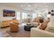 Bright and airy living room with updated fixtures and an open layout at 8877 E Riviera Dr, Scottsdale, AZ 85260