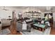 Inviting living room with rustic wood accents, an open floor plan, and comfortable seating perfect for entertaining at 9401 N 122Nd Pl, Scottsdale, AZ 85259