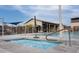 Relaxing community hot tub and lounging areas next to pool at 10043 W Foothill Dr, Peoria, AZ 85383