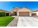 Attractive two-story home with well-maintained lawn and desert landscaping at 10043 W Foothill Dr, Peoria, AZ 85383