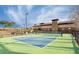 Outdoor pickleball court with blue and green surface, perfect for active community living at 10043 W Foothill Dr, Peoria, AZ 85383