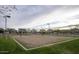 Community sand volleyball court surrounded by grassy area at 10043 W Foothill Dr, Peoria, AZ 85383