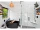 Modern bathroom showcasing a freestanding tub, glass-enclosed shower, and sleek fixtures for a luxurious feel at 11033 E Poinsettia Dr, Scottsdale, AZ 85259