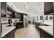 Modern kitchen featuring stainless steel appliances, sleek cabinetry, and a spacious layout at 11033 E Poinsettia Dr, Scottsdale, AZ 85259