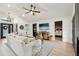 Comfortable living room featuring a large sectional, modern accents, and an open layout at 11033 E Poinsettia Dr, Scottsdale, AZ 85259