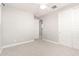 Neutral bedroom with carpeted floors, ceiling fan and ensuite access at 13660 N 144Th Ln, Surprise, AZ 85379