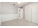 Bedroom featuring carpeted floors, white trim and ceiling fan with a light at 13660 N 144Th Ln, Surprise, AZ 85379