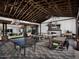 Spacious recreation area with ping pong table, fireplace, and ample seating at 13660 N 144Th Ln, Surprise, AZ 85379
