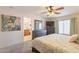Spacious bedroom with a ceiling fan, carpet, and ensuite bathroom provides a private retreat at 1374 E Linda Dr, Casa Grande, AZ 85122