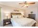 Comfortable bedroom with neutral tones and wooden furniture provides a relaxing and serene setting at 1374 E Linda Dr, Casa Grande, AZ 85122