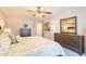 Serene bedroom with carpet and a wooden furniture set presents a comfortable and calming space at 1374 E Linda Dr, Casa Grande, AZ 85122