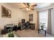 Functional office with a ceiling fan and desk setup is perfect for work or study at 1374 E Linda Dr, Casa Grande, AZ 85122