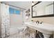Modern bathroom featuring a vanity, a bathtub and a toilet at 15021 N 19Th Way, Phoenix, AZ 85022