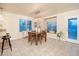 Inviting breakfast nook bathed in natural light with backyard access and quaint accent decor at 15021 N 19Th Way, Phoenix, AZ 85022