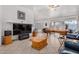 Spacious living room with tile flooring and large windows, providing plenty of natural light at 1569 E Princeton Ave, Gilbert, AZ 85234