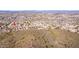 An aerial view of the community, in close proximity to desert trails, with mountain views from select lots at 1614 E Kathleen Rd, Phoenix, AZ 85022