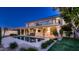 Expansive backyard with a refreshing pool, covered patio, and well-manicured lawn, ideal for leisure at 1614 E Kathleen Rd, Phoenix, AZ 85022